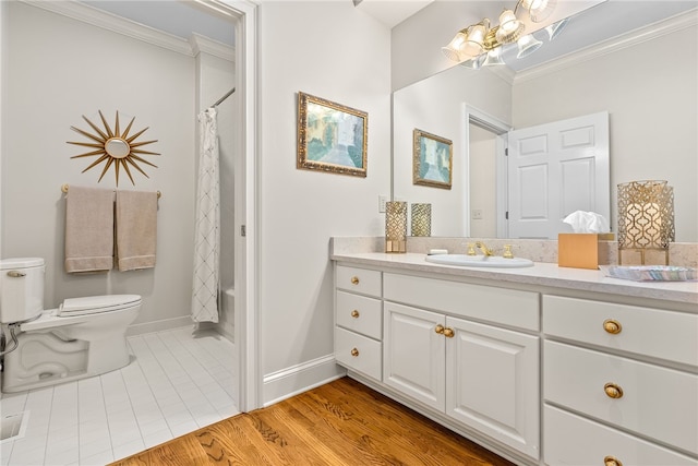 full bathroom with shower / bath combo with shower curtain, toilet, vanity, and ornamental molding