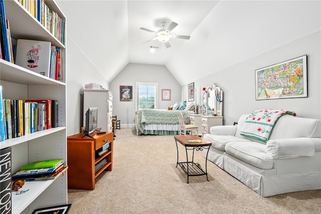 carpeted bedroom featuring ceiling fan and lofted ceiling