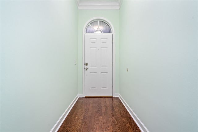 entryway with crown molding and dark wood-type flooring