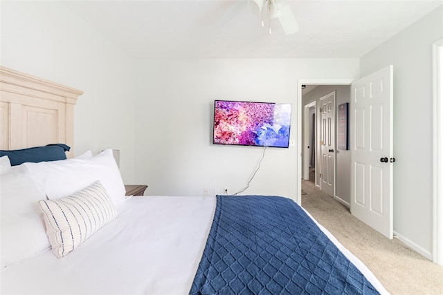1477 N Donahue Dr N Unit 1602, Auburn, AL 36830 - carpeted bedroom featuring ceiling fan and baseboards