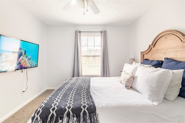 1477 N Donahue Dr N Unit 1602, Auburn, AL 36830 - carpeted bedroom featuring baseboards and ceiling fan