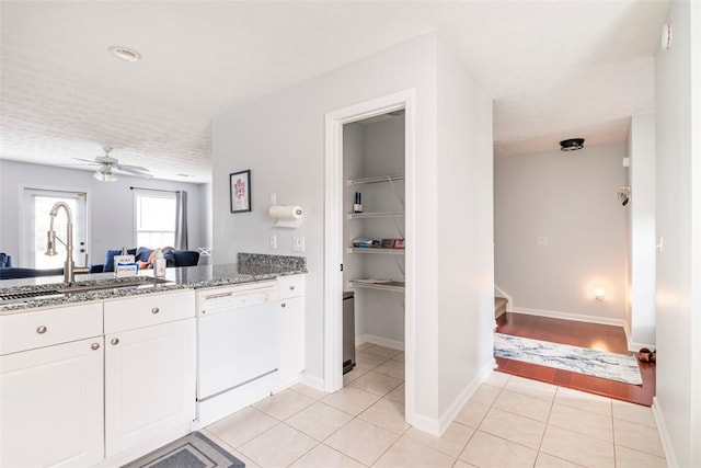 1477 N Donahue Dr N Unit 1602, Auburn, AL 36830 - bathroom with tile patterned floors, vanity, ceiling fan, and baseboards