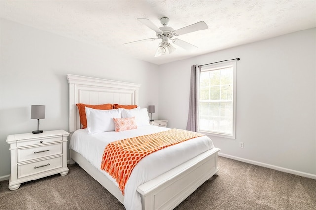 1477 N Donahue Dr N Unit 1602, Auburn, AL 36830 - bedroom with carpet floors, baseboards, and a ceiling fan