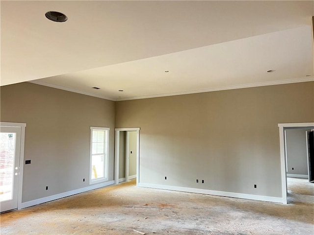 unfurnished room with crown molding