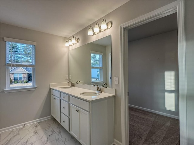2113 Covey Dr, Auburn, AL 36879 - full bathroom featuring plenty of natural light, baseboards, marble finish flooring, and double vanity