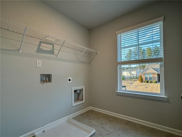 clothes washing area with laundry area, hookup for a washing machine, baseboards, and electric dryer hookup