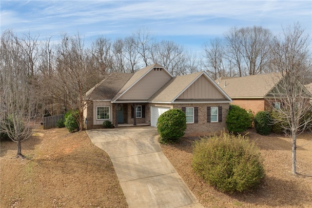 1756 Vfw Rd, Auburn, AL 36832 - view of front of home with concrete driveway, brick siding, and an attached garage