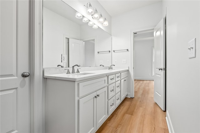 1756 Vfw Rd, Auburn, AL 36832 - full bath with wood finished floors and double vanity