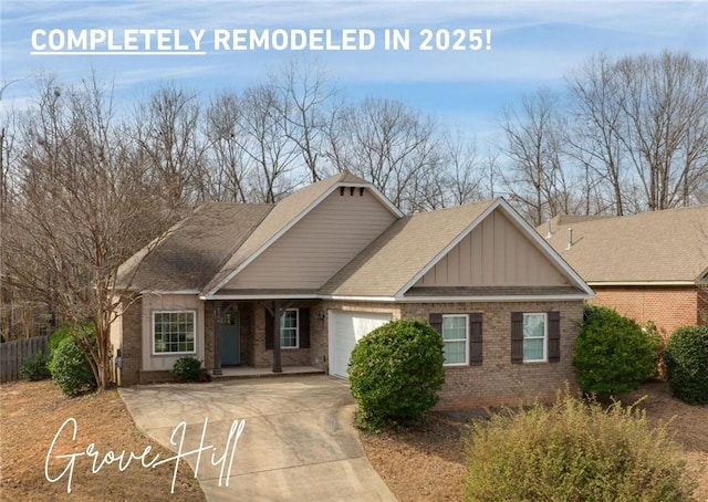 1756 Vfw Rd, Auburn, AL 36832 - view of front facade with brick siding, an attached garage, board and batten siding, driveway, and a shingled roof