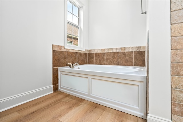 1756 Vfw Rd, Auburn, AL 36832 - full bath featuring a bath and wood finished floors