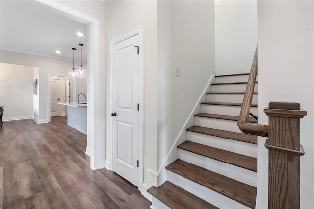 564 Grey Oak Cir, Auburn, AL 36830 - staircase featuring wood finished floors, recessed lighting, and ornamental molding