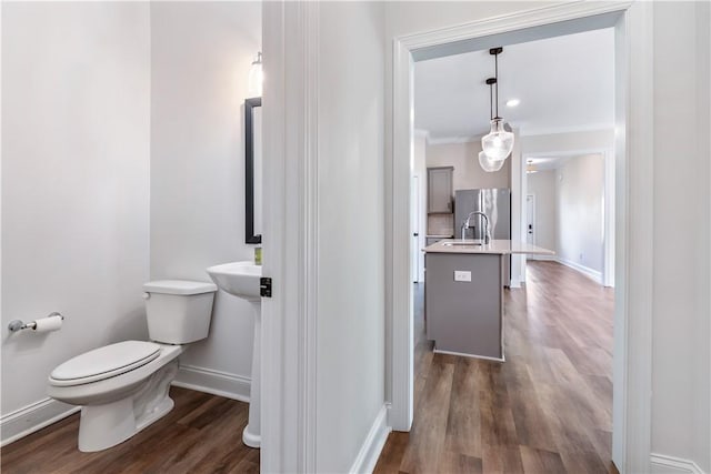 564 Grey Oak Cir, Auburn, AL 36830 - bathroom featuring wood finished floors and ornamental molding