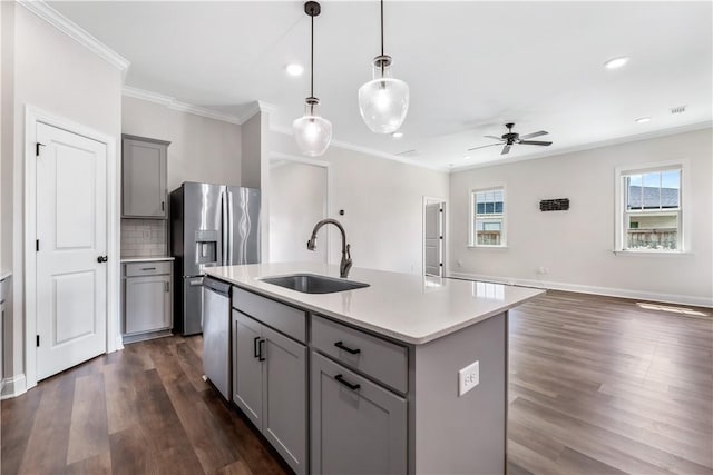564 Grey Oak Cir, Auburn, AL 36830 - kitchen featuring gray cabinets, ornamental molding, ceiling fan, light countertops, and appliances with stainless steel finishes