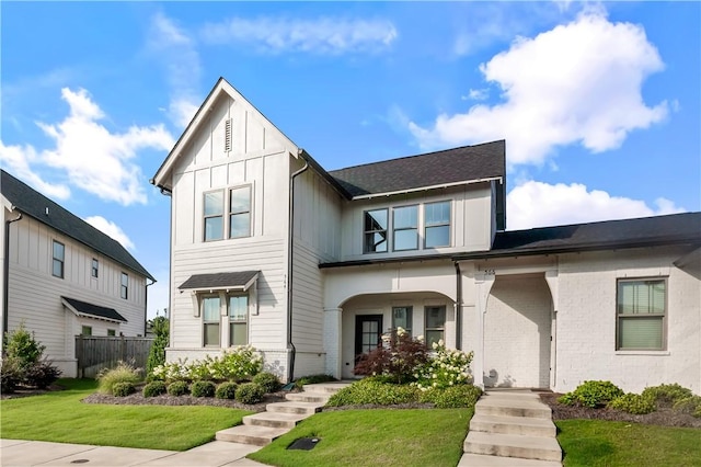 564 Grey Oak Cir, Auburn, AL 36830 - view of front facade with board and batten siding, brick siding, and a shingled roof