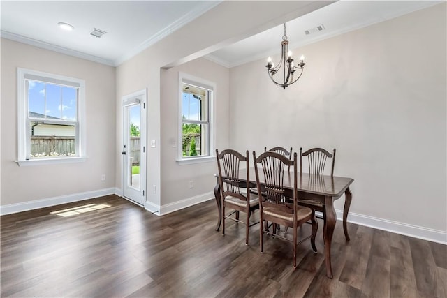 564 Grey Oak Cir, Auburn, AL 36830 - dining room featuring a chandelier, dark wood finished floors, and crown molding