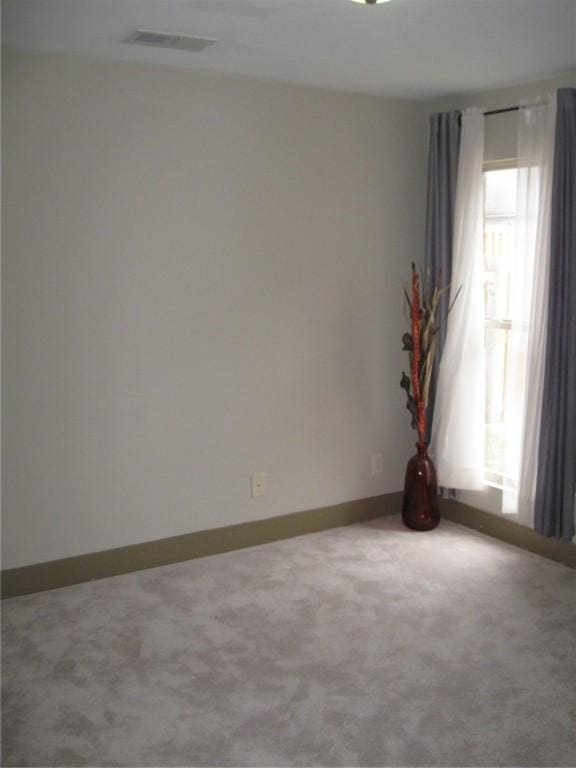 spare room with carpet