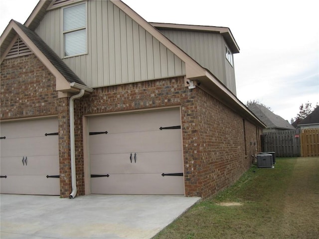 view of side of home featuring cooling unit