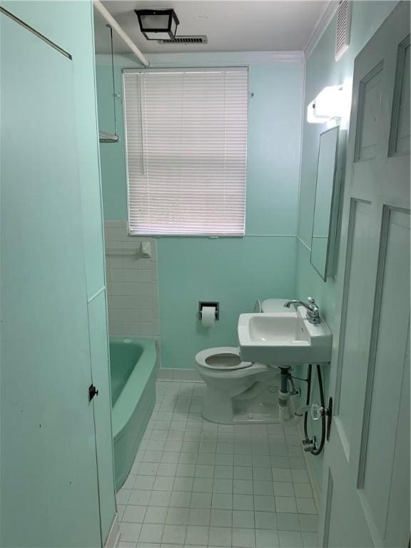 336 Payne St, Auburn, AL 36830 - bathroom featuring tile patterned flooring, a sink, toilet, and baseboards