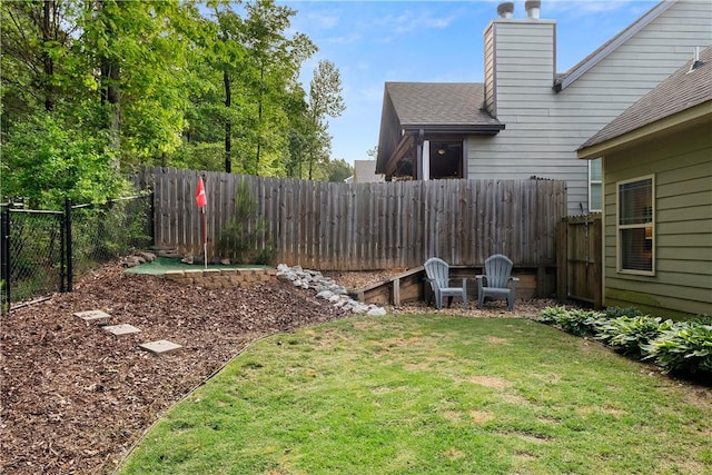 view of yard featuring a fenced backyard