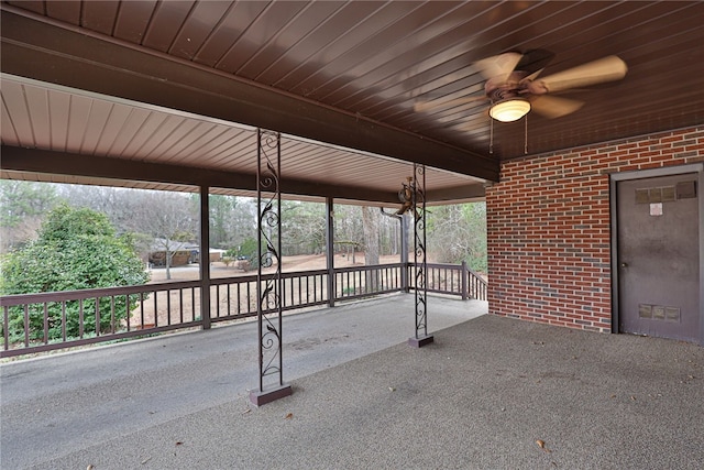 view of patio featuring ceiling fan