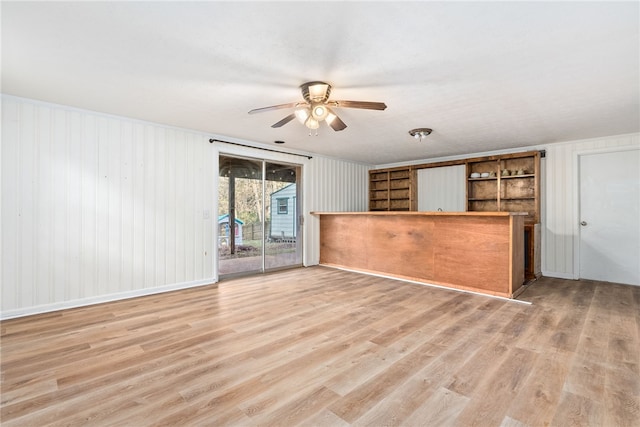 interior space featuring ceiling fan and light hardwood / wood-style floors