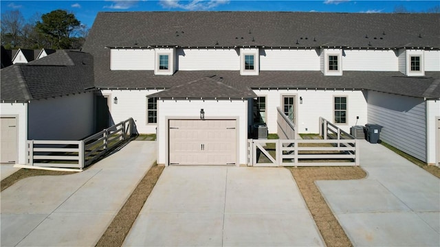 0309 Northgate Blvd, Auburn, AL 36830 - modern farmhouse with a shingled roof, driveway, and a garage