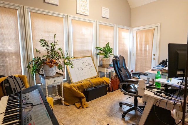 office featuring light tile patterned floors and a healthy amount of sunlight