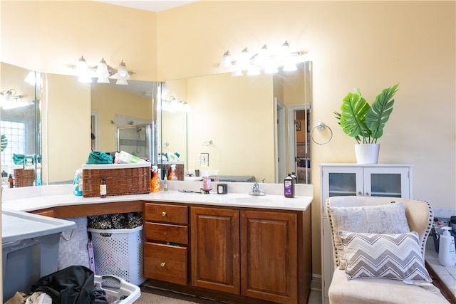 bathroom with vanity and an enclosed shower