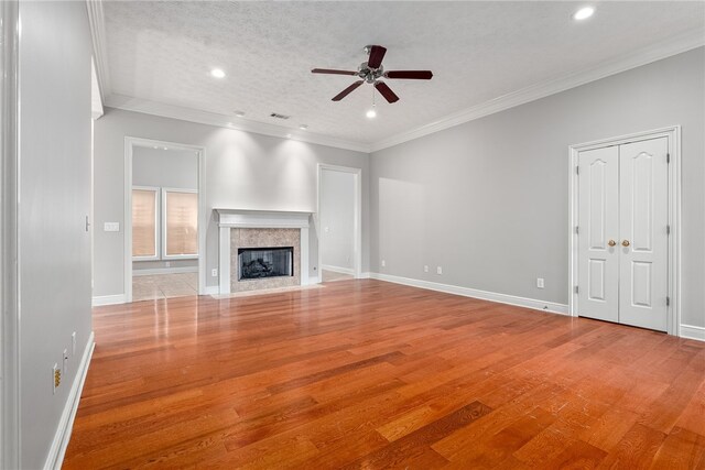 unfurnished living room with a ceiling fan, wood finished floors, and recessed lighting