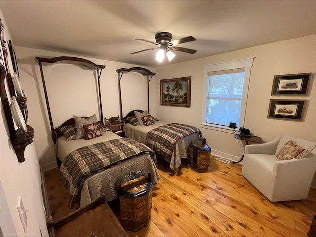 bedroom featuring ceiling fan and light wood-type flooring