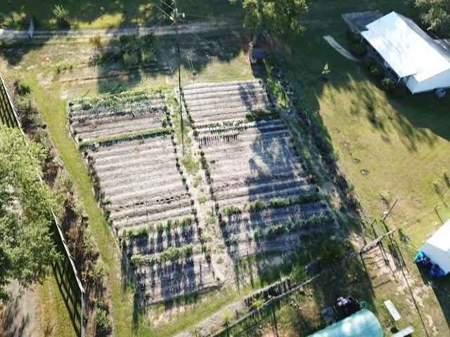 birds eye view of property featuring a rural view