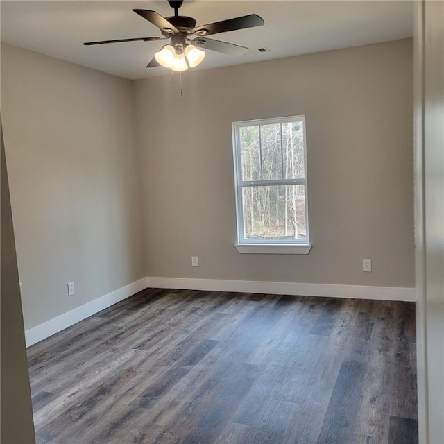 empty room featuring ceiling fan and wood-type flooring