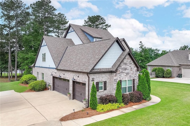 2131 Preserve Dr, Auburn, AL 36879 - view of front of property featuring concrete driveway, a front lawn, a garage, and a shingled roof