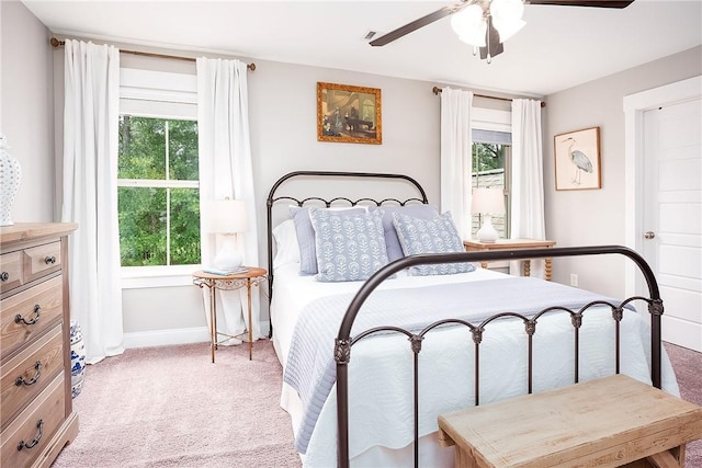 2131 Preserve Dr, Auburn, AL 36879 - bedroom with light colored carpet, baseboards, and a ceiling fan