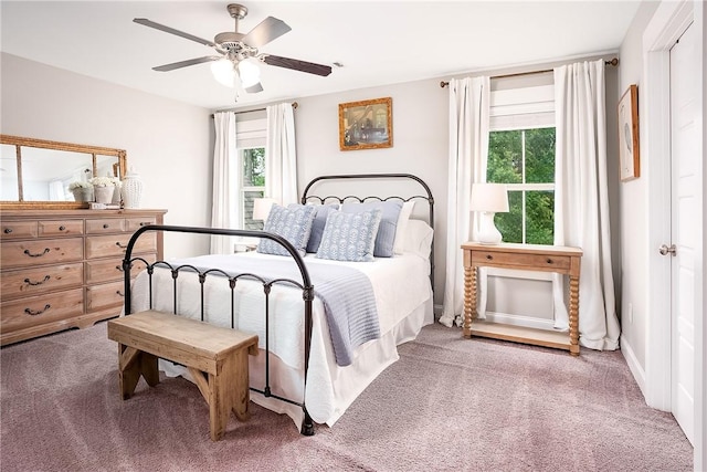 2131 Preserve Dr, Auburn, AL 36879 - carpeted bedroom featuring multiple windows and a ceiling fan