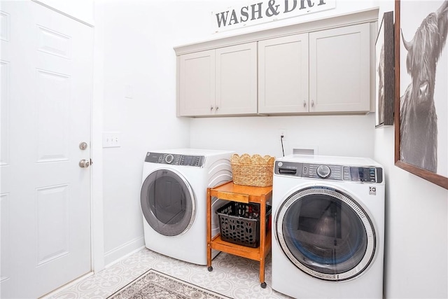 2131 Preserve Dr, Auburn, AL 36879 - washroom with washing machine and clothes dryer, cabinet space, and baseboards