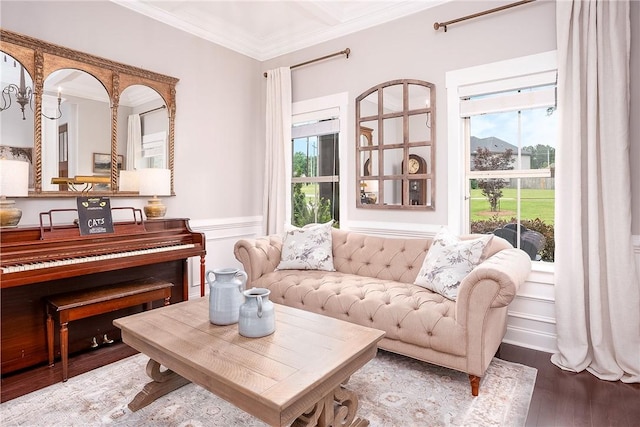 2131 Preserve Dr, Auburn, AL 36879 - living area with wood finished floors, plenty of natural light, crown molding, and a wainscoted wall