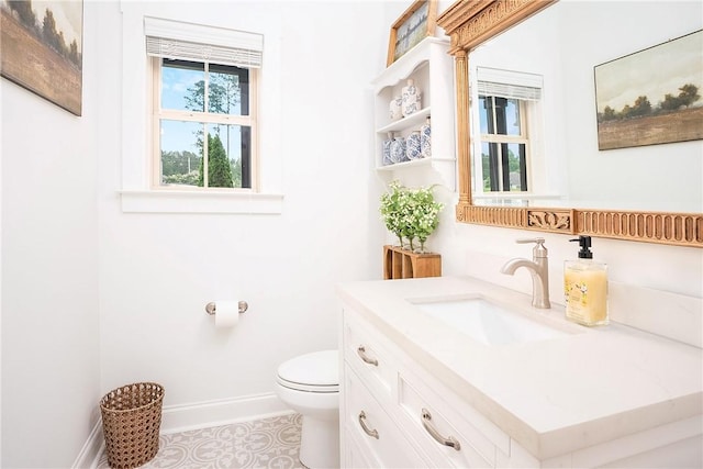 2131 Preserve Dr, Auburn, AL 36879 - bathroom with baseboards, toilet, vanity, and tile patterned flooring