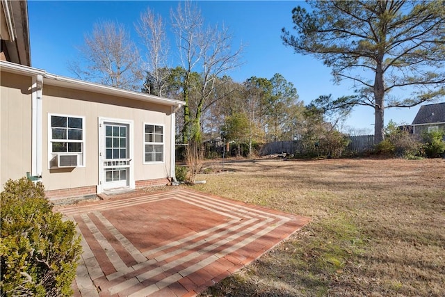 view of yard featuring cooling unit and a patio