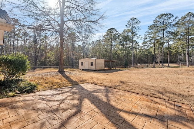 view of patio / terrace with a storage shed