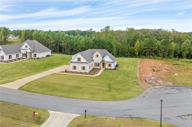 aerial view with a wooded view