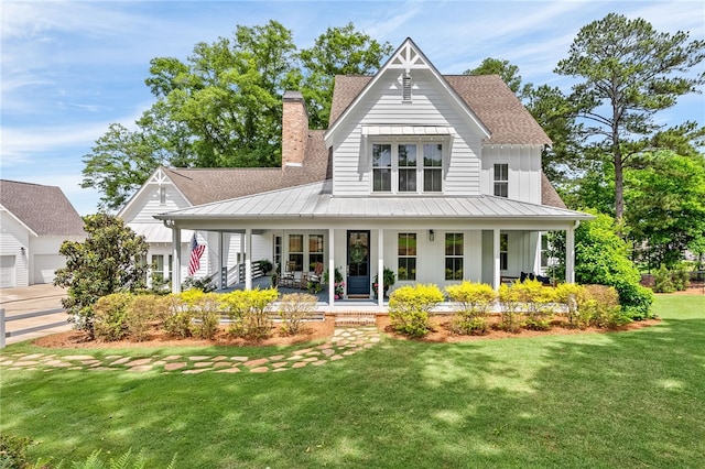 view of front of house featuring a front lawn and a porch