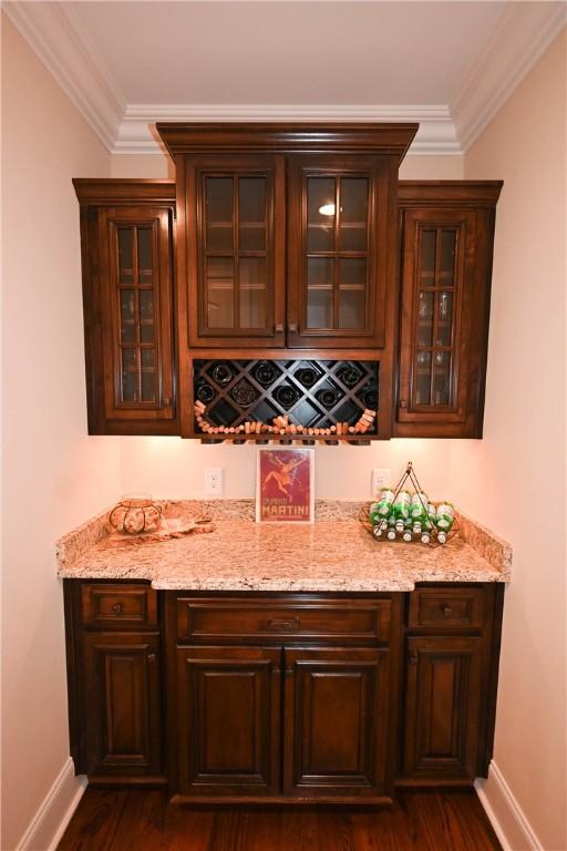 bathroom with vanity and crown molding