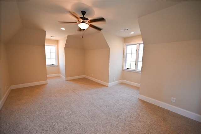 bonus room featuring recessed lighting, visible vents, light carpet, and baseboards