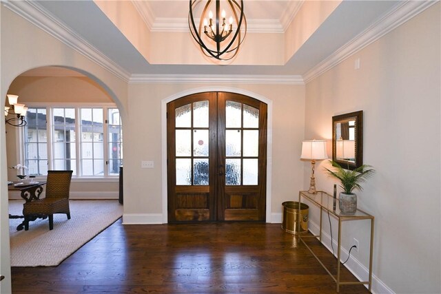 kitchen with beam ceiling, dark brown cabinetry, sink, a fireplace, and a center island with sink