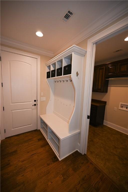 mudroom featuring ornamental molding, recessed lighting, visible vents, and dark wood finished floors