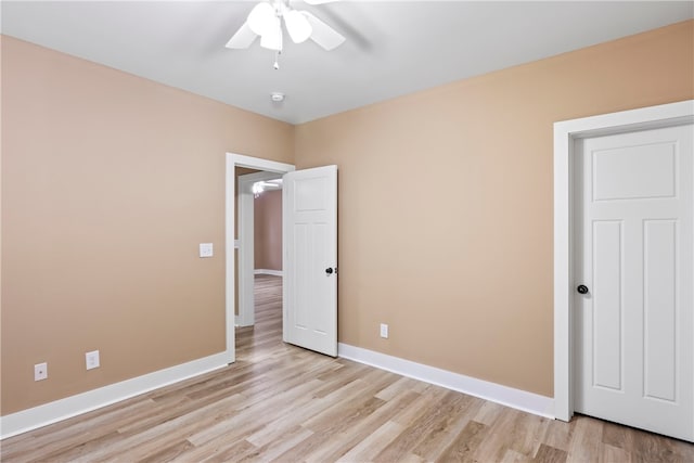 unfurnished bedroom featuring light hardwood / wood-style floors and ceiling fan