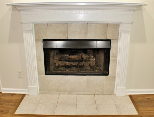50 Cricket Rdg, Tallassee, AL 36078 - detailed view of a fireplace, baseboards, and wood finished floors