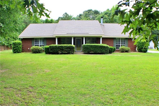 50 Cricket Rdg, Tallassee, AL 36078 - ranch-style home featuring a front yard, a shingled roof, and brick siding