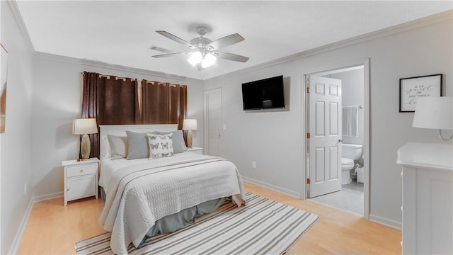 bedroom with connected bathroom, ceiling fan, light hardwood / wood-style flooring, and crown molding